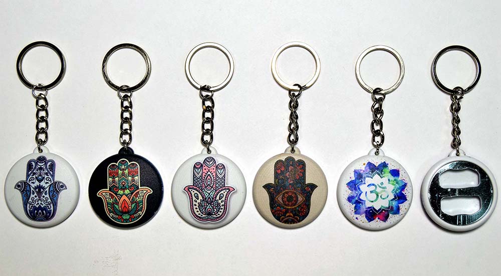 PORTACHIAVI APRIBOTTIGLIE CRISTAL Y PLATA HAMSA